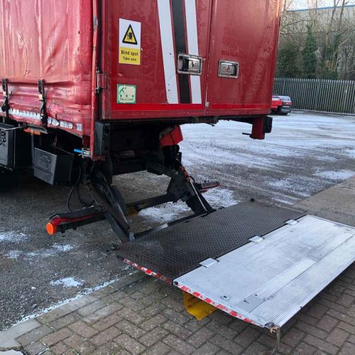 red man lorry rear end lift