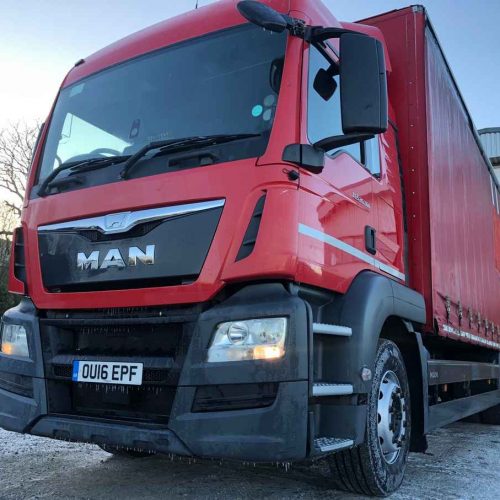 red man lorry exterior front end left